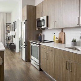 a kitchen with white cabinets