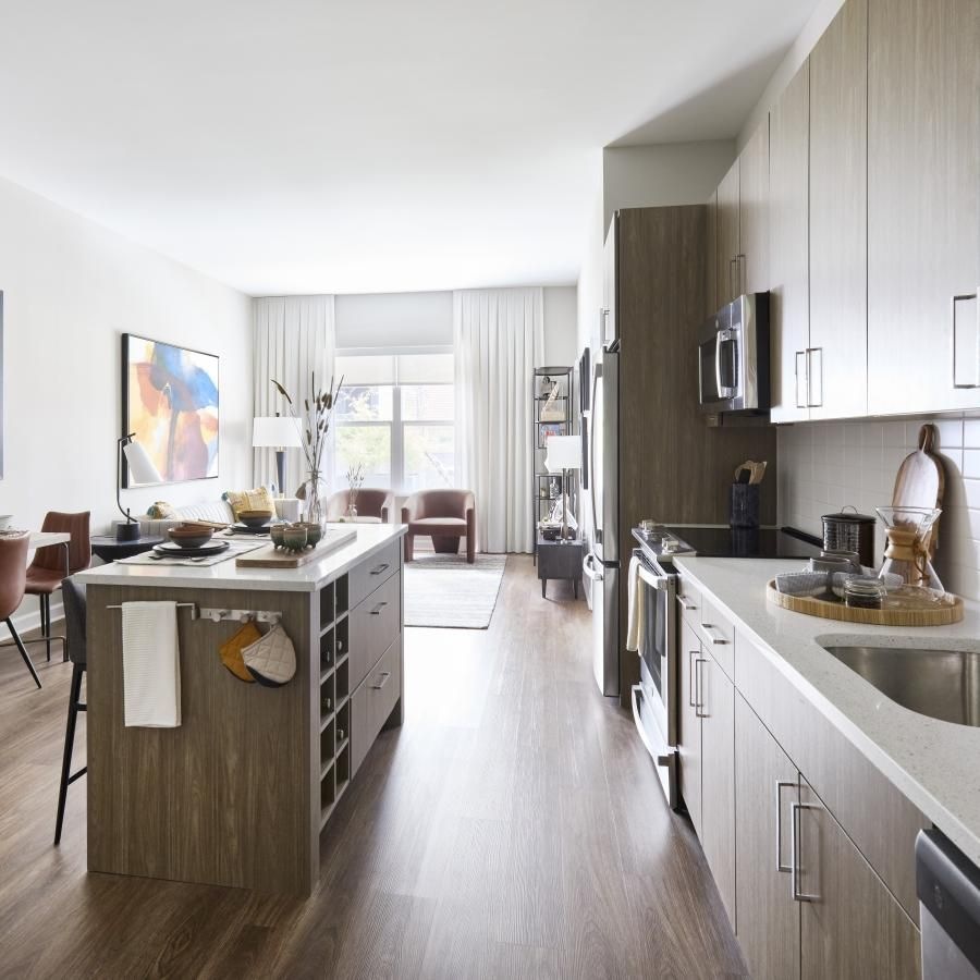a kitchen with a wood floor