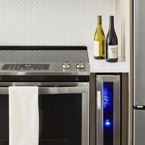 a kitchen with stainless steel appliances